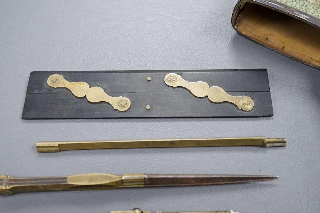 A Georgian draftsman’s set in a shagreen case, with fitted interior containing drawing instruments (some missing), 17.5cm high.